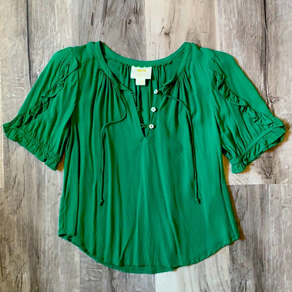 Emerald green blouse from Anthropologie.